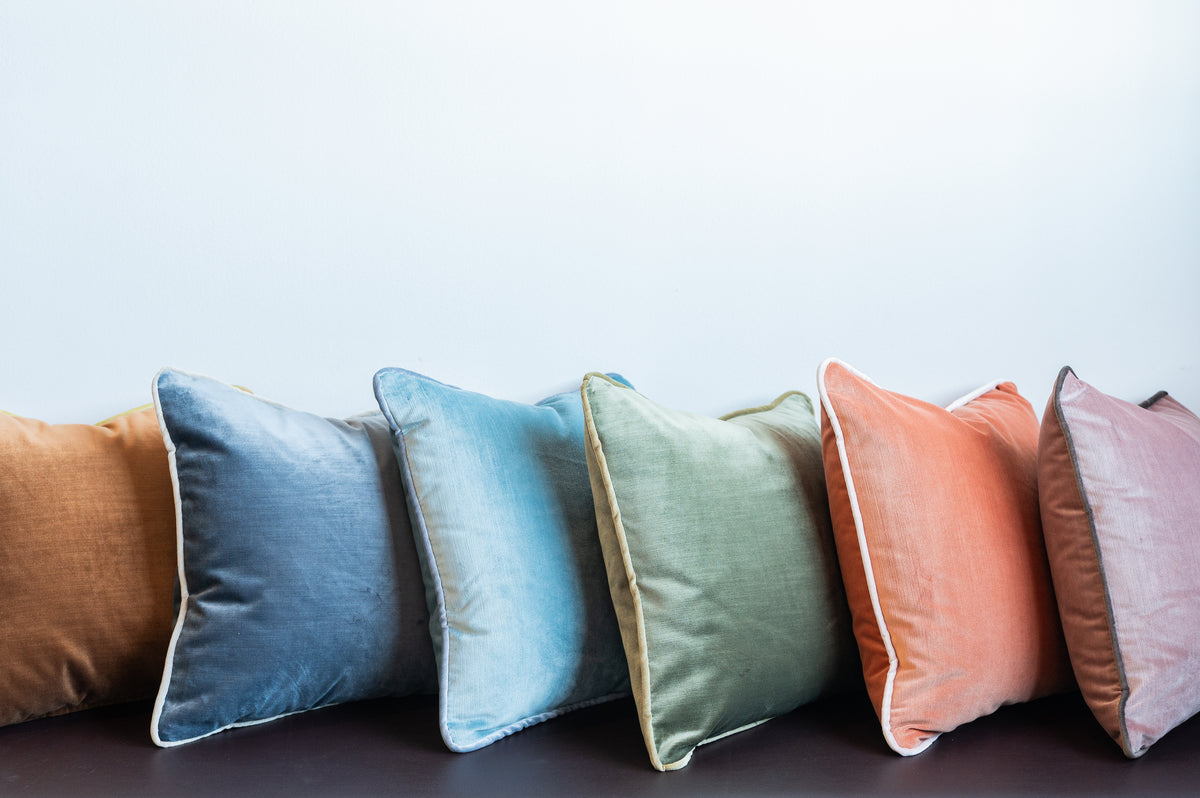 Lucie velvet pillows with contrast piping, sewn in our North Carolina workroom
